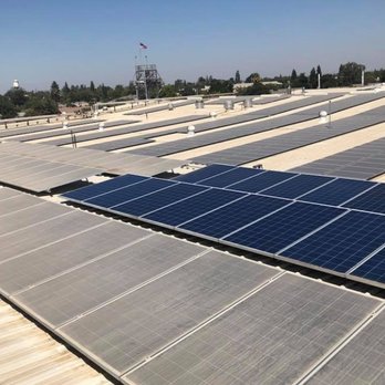 Solar Wash Pros - Progress in Solar Panel Cleaning on a Commercial Roof - Solar Panel Cleaning Near Me