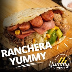 Yummy Arepas - Mozarella Cheese, Shredded Bef, Sweet Corn, Colombian Sausage, Ham, Avocvado, and Yummy Sauce of Your Choice!