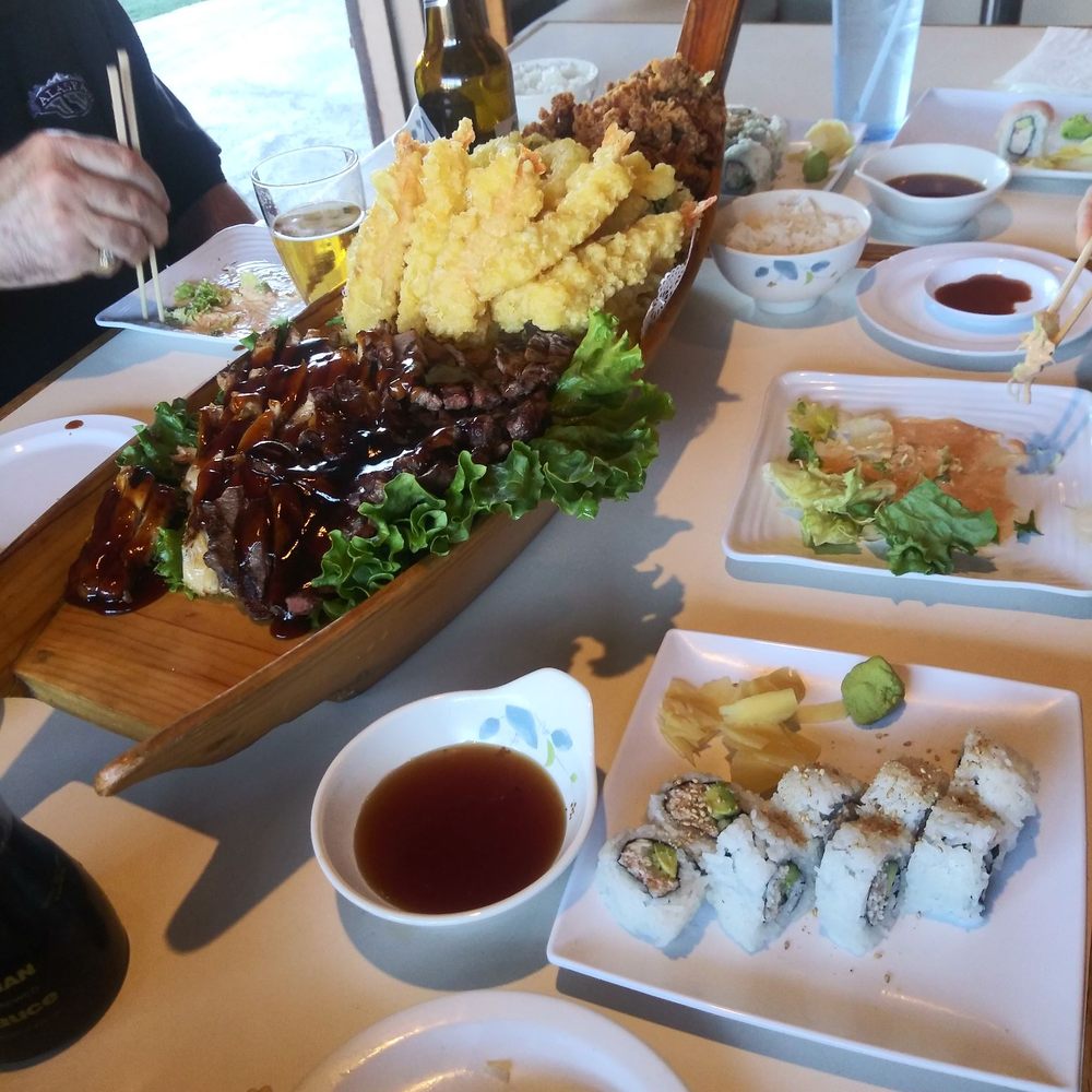 Ichiban Japanese & Sushi Restaurant - Family Boat-soup, salad, rice, 4 pc. Calif. roll, tempura shrimp and veggies, teriyaki chicken and beef, and chicken karrage. - Japanese Near Me - Brea, California