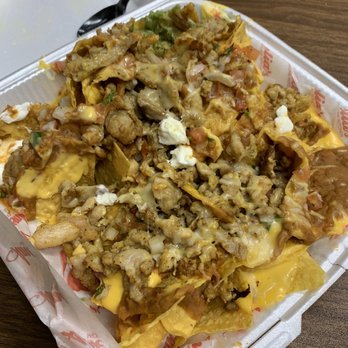 Amelias Mexican Kitchen - Grilled Chicken Grilled Nachos, I think it's a huge serving for one person. I have enough for dinner tonight! - Mexican Near Me - Tucson, Arizona