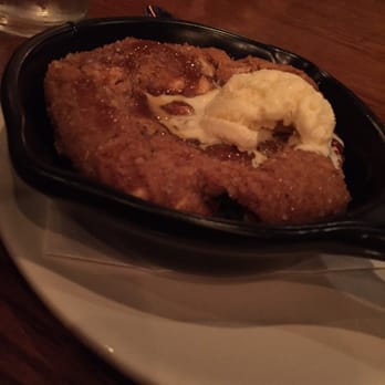 Outback Steakhouse - Salted caramel cookie skillet with less than even a dollop of ice cream - Steakhouses Near Me - Matthews, North Carolina