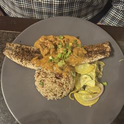 Fremin's Restaurant - Blackened redfish with pecan rice pilaf and vegetable medley