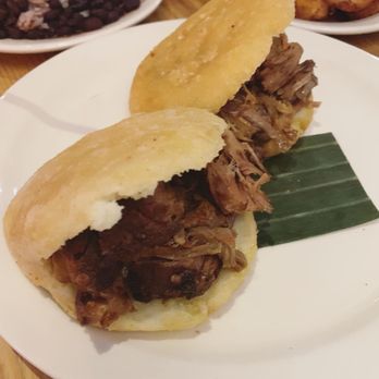 Valencia Cocina - Arepas filled with Pernil (pulled pork shoulder) - Latin American Near Me - Norwalk, Connecticut Valencia Cocina - Arepas filled with Pernil (pulled pork shoulder) - Latin American Near Me - Norwalk, Connecticut