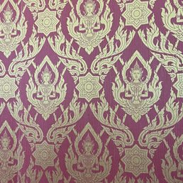 Awesome Buddha style wallpaper throughout restaurant.