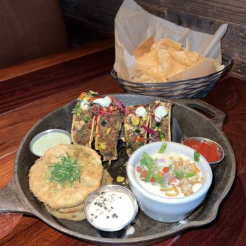 The Ranch - Cornmeal Fried Green Tomatoes, Mini Elk Tacos, and Queso Blanco - Steakhouses Near Me - Irving, Texas The Ranch - Cornmeal Fried Green Tomatoes, Mini Elk Tacos, and Queso Blanco - Steakhouses Near Me - Irving, Texas