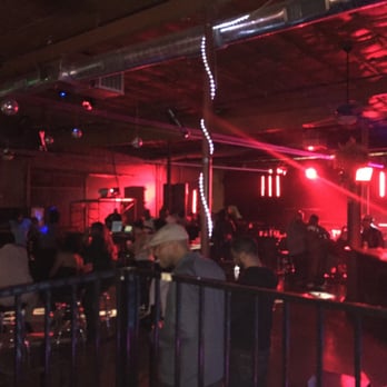 The Rock Box - a group of people at a bar - Bars Near Me - San Antonio, Texas The Rock Box - a group of people at a bar - Bars Near Me - San Antonio, Texas