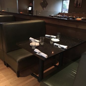 Pizzeta Enoteca - a table and chairs in a restaurant - Italian Near Me - Livingston, New Jersey