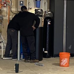 Priority Plumbing - The team checking for leaks after install.