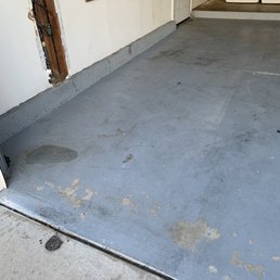 a concrete floor with a hole in it