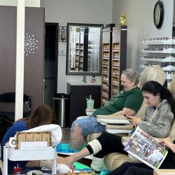 Wife waiting for Sue to finish, as others are enjoying a foot bath.
