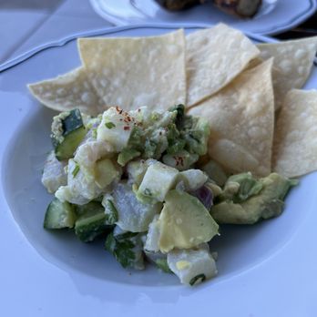 Sfizio - Rockfish ceviche with avocado and cucumbers and chips - Italian Near Me - Oakland, California Sfizio - Rockfish ceviche with avocado and cucumbers and chips - Italian Near Me - Oakland, California