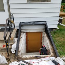 Easy Does It Home Repair - before, installing new bilko basement door