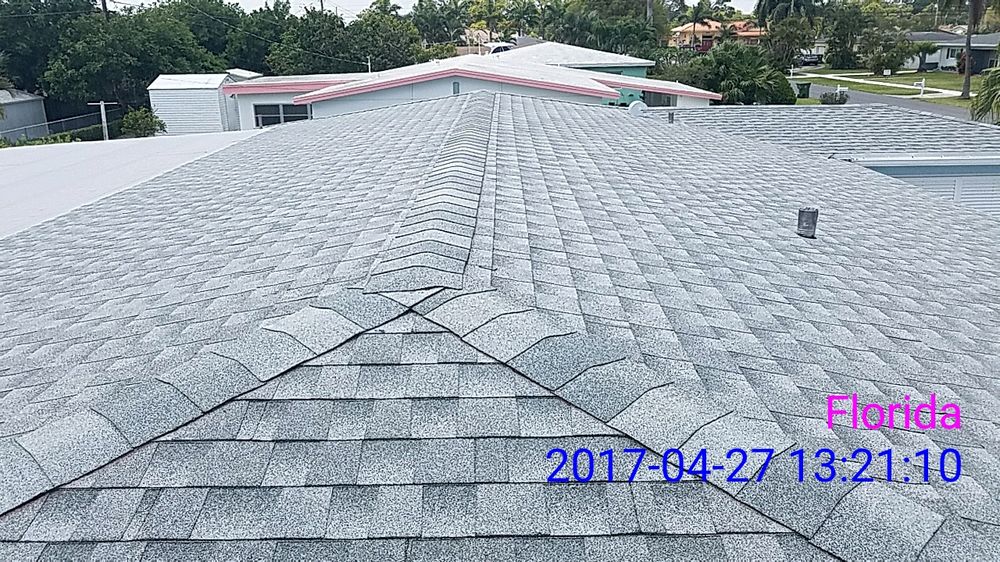 Slide of Solis Roofing Contractors