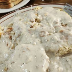 Half and half gravy and biscuits with hashbrowns