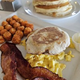 2 egg breakfast with sweet potato tots and ordered an extra side if pancakes.