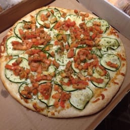 The amazing tomato and zucchini pizza.