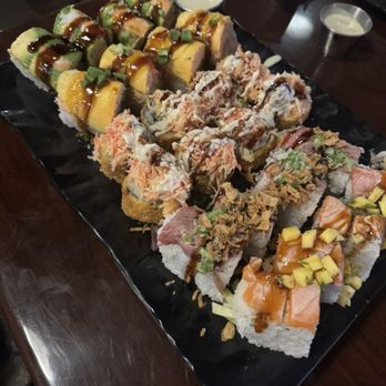 Kai Sushi and Sake Bar - From left to right: Piano (6/10), Twisted Mango (7/10), Magma (8/10), Surf Turf (9/10), Mango Tango (9/10) - Japanese Near Me - Raleigh, North Carolina Kai Sushi and Sake Bar - From left to right: Piano (6/10), Twisted Mango (7/10), Magma (8/10), Surf Turf (9/10), Mango Tango (9/10) - Japanese Near Me - Raleigh, North Carolina