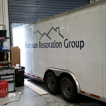 Hampton Restoration Group - a trailer in a garage - Damage Restoration Near Me - Jasper, Georgia
