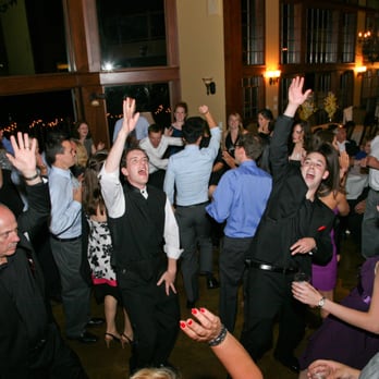 Versatile Sound Productions - DJ Nick Sal Interacting with crowd at a wedding located at "Skiesta" - near Sunday River, Maine - Party & Event Planning Near Me - Cohasset, Massachusetts Versatile Sound Productions - DJ Nick Sal Interacting with crowd at a wedding located at "Skiesta" - near Sunday River, Maine - Party & Event Planning Near Me - Cohasset, Massachusetts