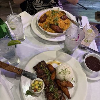 El Floridita - We had the Arroz con Pollo on the top and the Churrasco at the bottom. Churrasco was definitely a 10/10 cooked medium - Cuban Near Me - Los Angeles, California