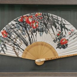 Bamboo fan with Asian traditional painting