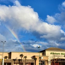 O'Brien's Market - Storefront of O'Brien's Market with a rainbow in the sky! :)