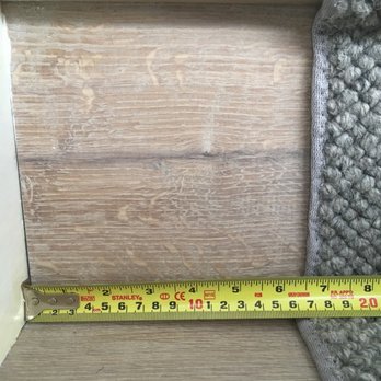 Floors To Go - a measuring tape on the floor - Flooring Near Me - Placerville, California Floors To Go - a measuring tape on the floor - Flooring Near Me - Placerville, California