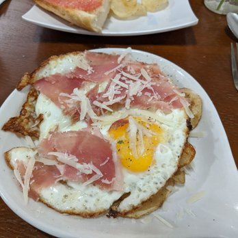 Little Madrid Tapas Cafe - Breakfast special: jamon and eggs over fried potatoes - tasty! - Spanish Near Me - Chicago, Illinois
