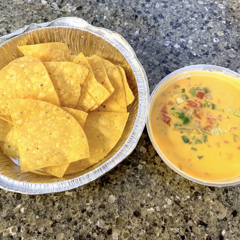 Breaking the Borders - Queso Dip (chorizo on bottom) and Chips - Food Trucks Near Me - Pasadena, Maryland Breaking the Borders - Queso Dip (chorizo on bottom) and Chips - Food Trucks Near Me - Pasadena, Maryland