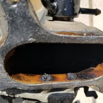 Austin Mobile Automotive - Ford throttle body with completely restricted EGR valve passages. - Auto Repair Near Me Austin Mobile Automotive - Ford throttle body with completely restricted EGR valve passages. - Auto Repair Near Me