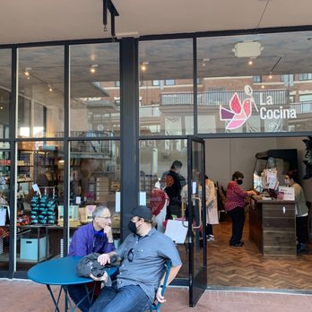 La Cocina - people sitting at tables in front of a store - Specialty Food Near Me - San Francisco, California La Cocina - people sitting at tables in front of a store - Specialty Food Near Me - San Francisco, California