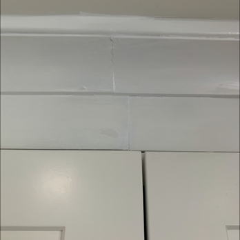 Stott Construction & Electrical Systems - Molding above wall cabinet not plum or level. Multiple seams in same area, used a different color paint on different sections. - General Contractors Near Me - Camarillo, California Stott Construction & Electrical Systems - Molding above wall cabinet not plum or level. Multiple seams in same area, used a different color paint on different sections. - General Contractors Near Me - Camarillo, California
