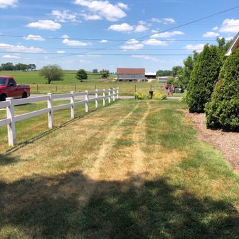 TruGreen Lawn Care - a white fence and a red truck - Tree Services Near Me - Gaithersburg, Maryland TruGreen Lawn Care - a white fence and a red truck - Tree Services Near Me - Gaithersburg, Maryland