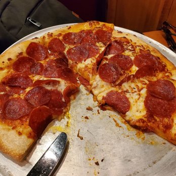 Johnny Carino's - Pepperoni pizza with only 1 slice gone. Got this with the meal for 2 as a sharable. Shared with our daughter lol. Was very good. - Italian Near Me - Meridian, Idaho Johnny Carino's - Pepperoni pizza with only 1 slice gone. Got this with the meal for 2 as a sharable. Shared with our daughter lol. Was very good. - Italian Near Me - Meridian, Idaho