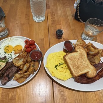 Yolked Kitchen - Left to Right: Tri Tip with Sunny Side up eggs; All American Plate with bacon and scrambled eggs - Breakfast & Brunch Near Me - Clovis, California