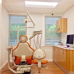 Heart Orthodontics - Private treatment room, super comfy chair, in-ceiling TV so you won't be bored during any appointments!