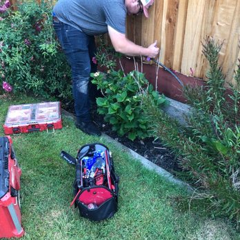 SLS Spinkler Tech - Sergey installing drip line system - Irrigation Near Me SLS Spinkler Tech - Sergey installing drip line system - Irrigation Near Me