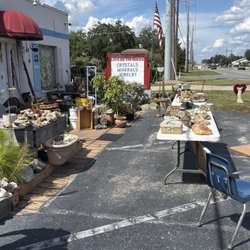 Love on the Rocks - Rocks on display tables outside.