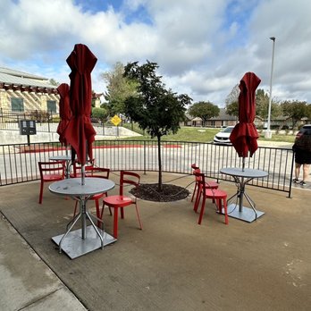 Sweetwaters Coffee & Tea - tables and umbrellas - Coffee & Tea Near Me - Denton, Texas Sweetwaters Coffee & Tea - tables and umbrellas - Coffee & Tea Near Me - Denton, Texas