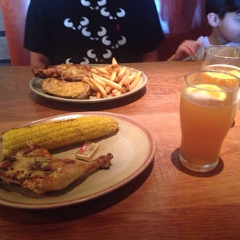 Nando's Peri-Peri - 1/4 chicken, corn, 1/2 chicken & fries. The chicken was good, especially the sauce. Blue moons are always good but these were not very cold. - Portuguese Near Me - Springfield, Virginia