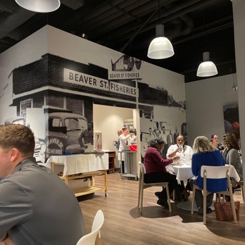 Cafe Frisch - people sitting at tables in a restaurant - Cooking Schools Near Me - Jacksonville, Florida