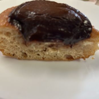 Kilani Bakery - Cross section of chocolate topped donut (real chocolate) - Bakeries Near Me - Wahiawa, Hawaii Kilani Bakery - Cross section of chocolate topped donut (real chocolate) - Bakeries Near Me - Wahiawa, Hawaii
