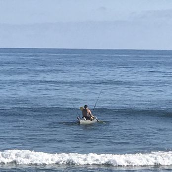 Dolphin Pool & Spa Center - a surfer in the ocean - Pool Cleaners Near Me Dolphin Pool & Spa Center - a surfer in the ocean - Pool Cleaners Near Me