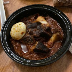 Oseikrom Restaurant - Aunty Lizzy - Goat that comes with jollof special