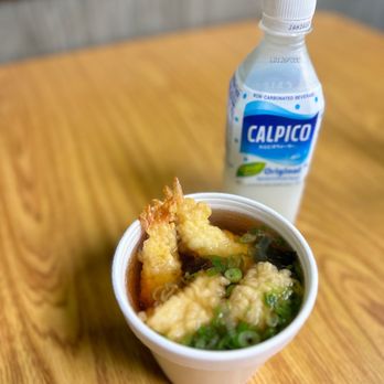 Sushi Raku - a bowl of food and a bottle of water - Japanese Near Me - Tamarac, Florida Sushi Raku - a bowl of food and a bottle of water - Japanese Near Me - Tamarac, Florida