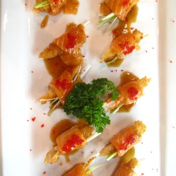 Akita - a plate of appetizers on a white plate - Japanese Near Me - Montreal, Quebec Akita - a plate of appetizers on a white plate - Japanese Near Me - Montreal, Quebec