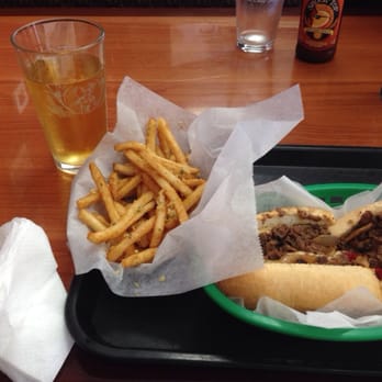 The Cheesesteak Grill - Garlic fries, the works cheesestake, and a beer. - Cheesesteaks Near Me - Oceanside, California The Cheesesteak Grill - Garlic fries, the works cheesestake, and a beer. - Cheesesteaks Near Me - Oceanside, California