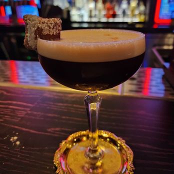 Voodoo Bayou - Turbo Lover Espresso Martini (with real espresso and a cute mini beignet--made me want to order a full box of beignets!) - Cocktail Bars Near Me - Orlando, Florida Voodoo Bayou - Turbo Lover Espresso Martini (with real espresso and a cute mini beignet--made me want to order a full box of beignets!) - Cocktail Bars Near Me - Orlando, Florida
