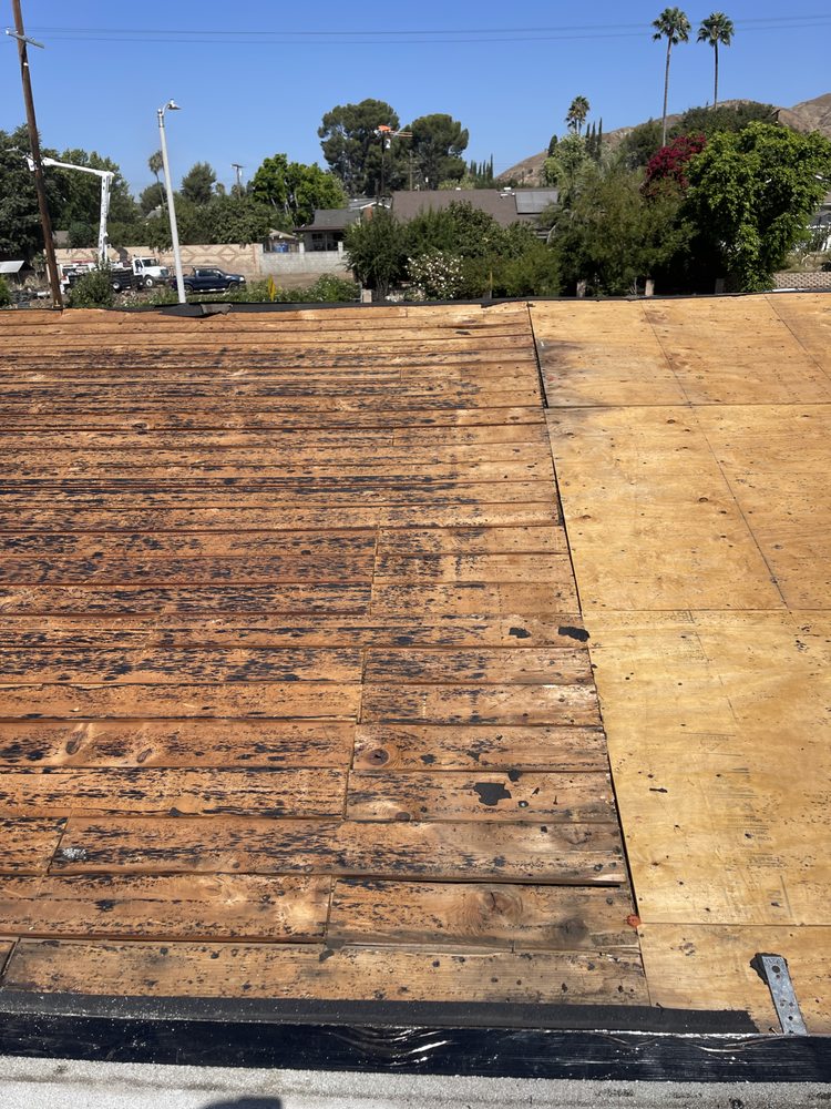 Slide of KAT Roofing