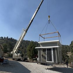 Schroder & Son - Moving our tiny house from one location to another on our property.